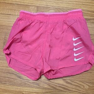 Nike Women's Athletic Shorts in Pink with White Swoosh